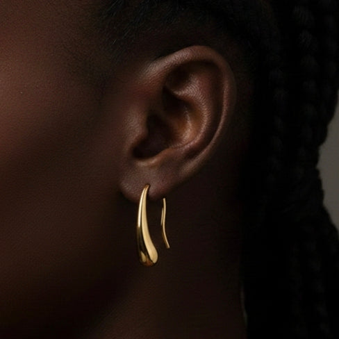 Elegant gold drop earrings perfect for wedding guest attire