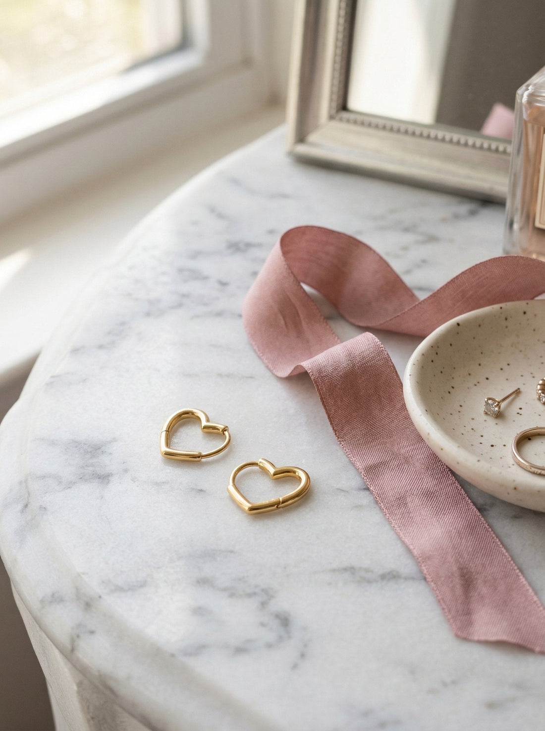 Heart hoop earrings styled as jewelry for a strapless dress