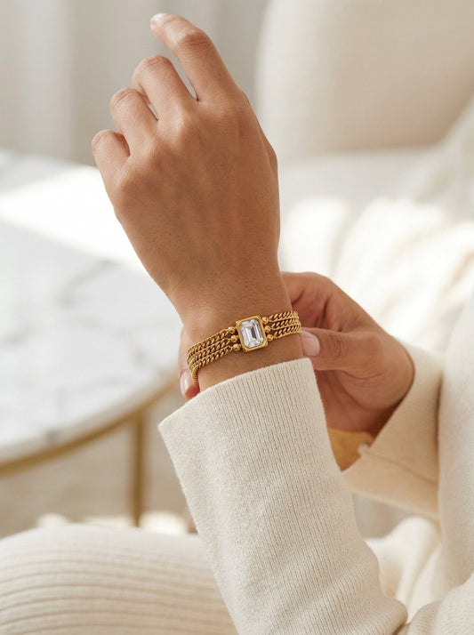Model wearing Dalis Multi-Strand CZ Station Bracelet in gold, elegant tennis bracelet style