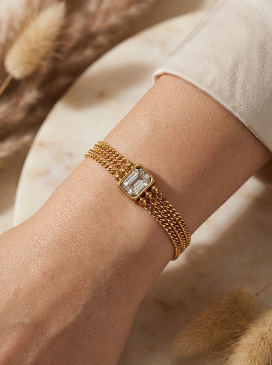 Bracelet stacking spring 2026 — arm party with gold layered bracelets