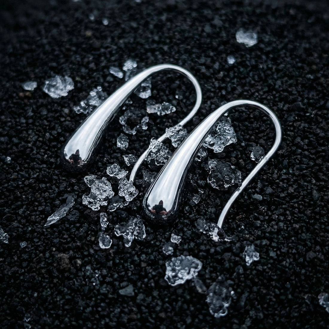 Tassel-inspired movement jewelry trend in silver drop earrings