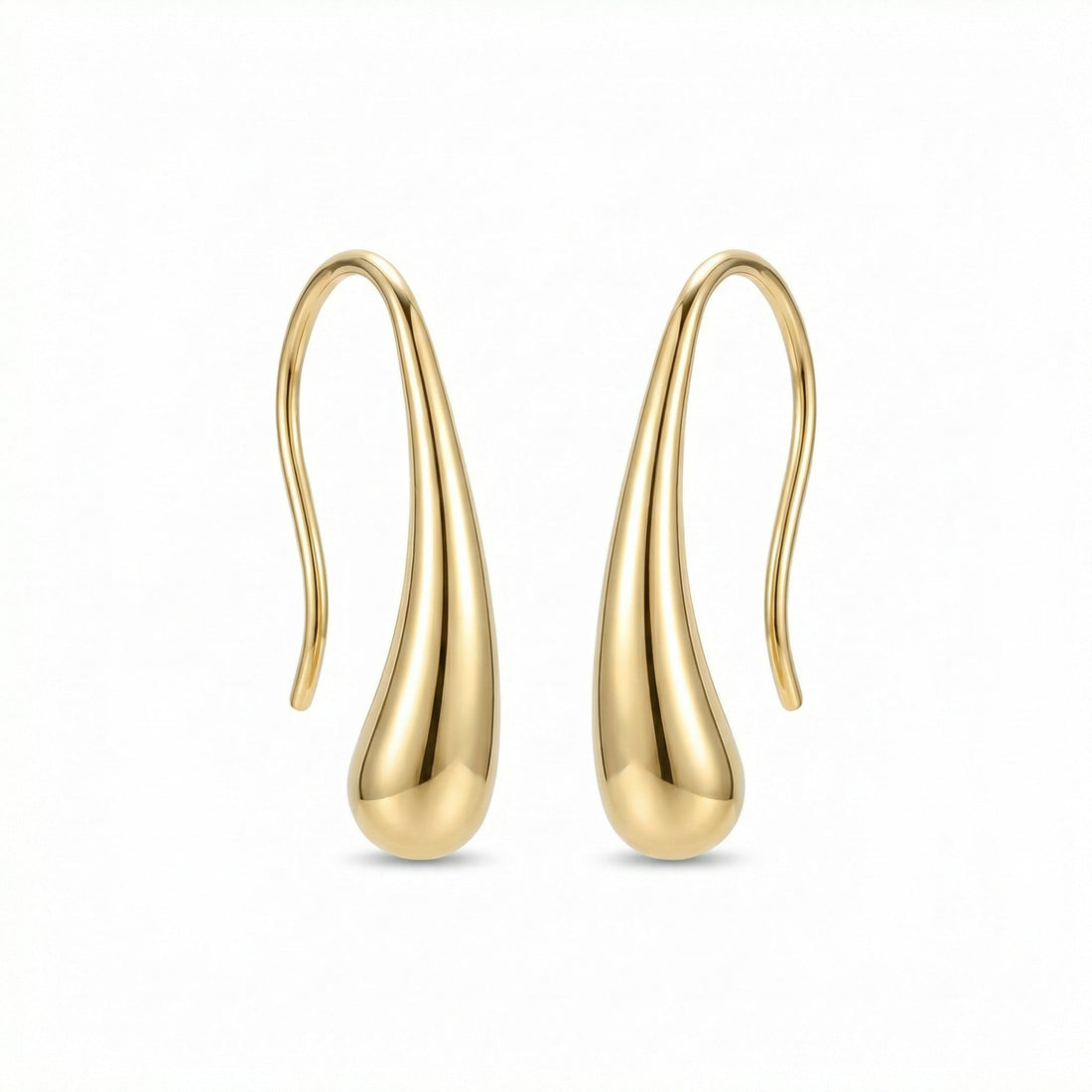 Woman wearing gold Deva Liquid Metal Water Drop Earrings — festival jewelry styling by HyraMode