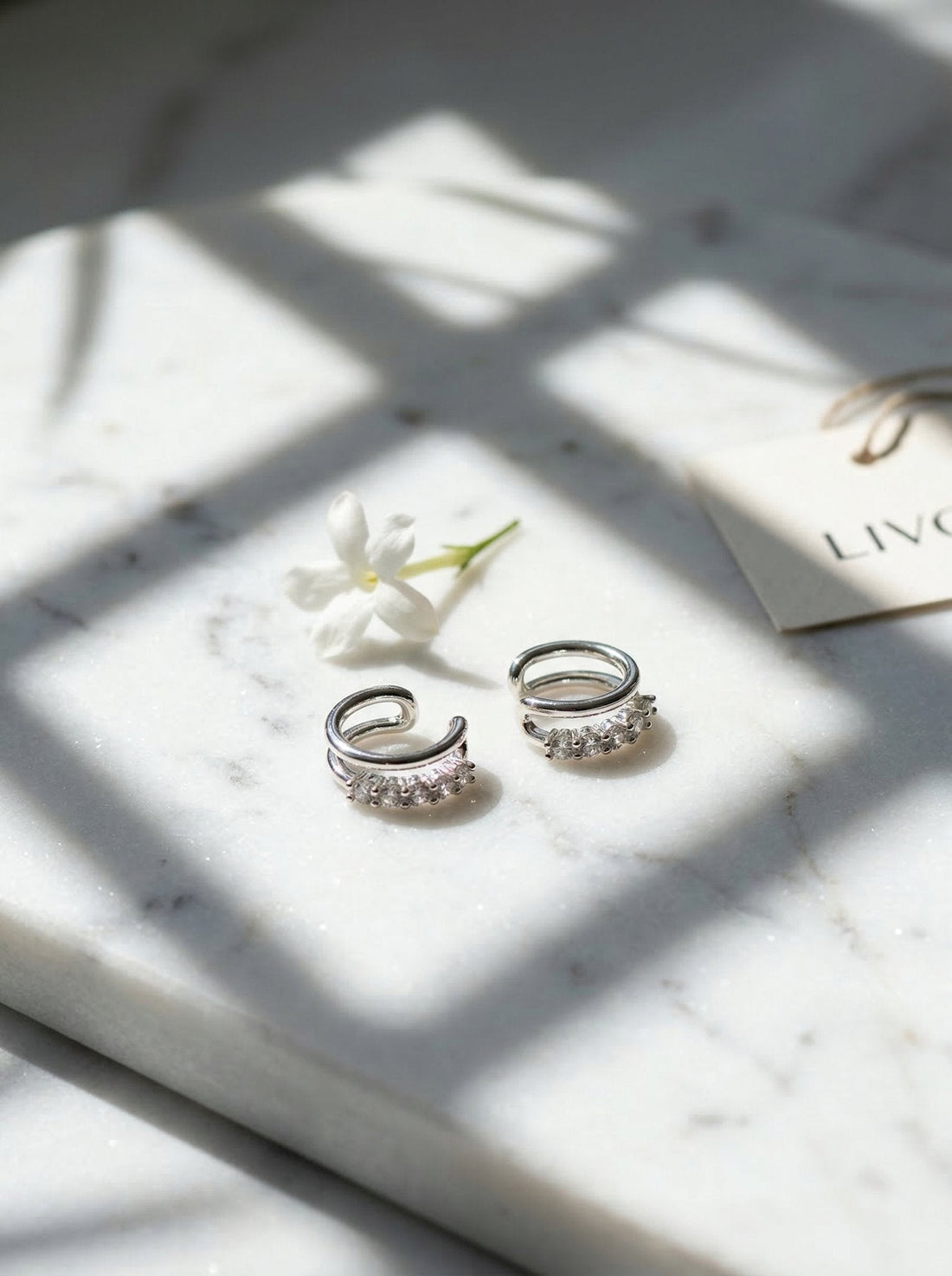 Personalized ear stack for spring 2026 featuring ear cuff and huggies