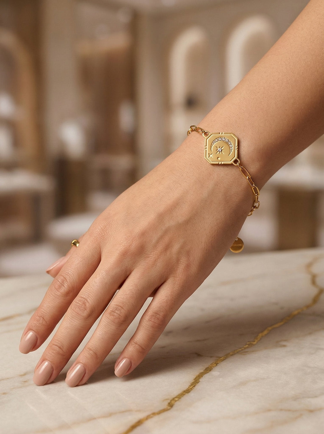 Nilo paperclip star charm bracelet for stacking bracelets with a watch