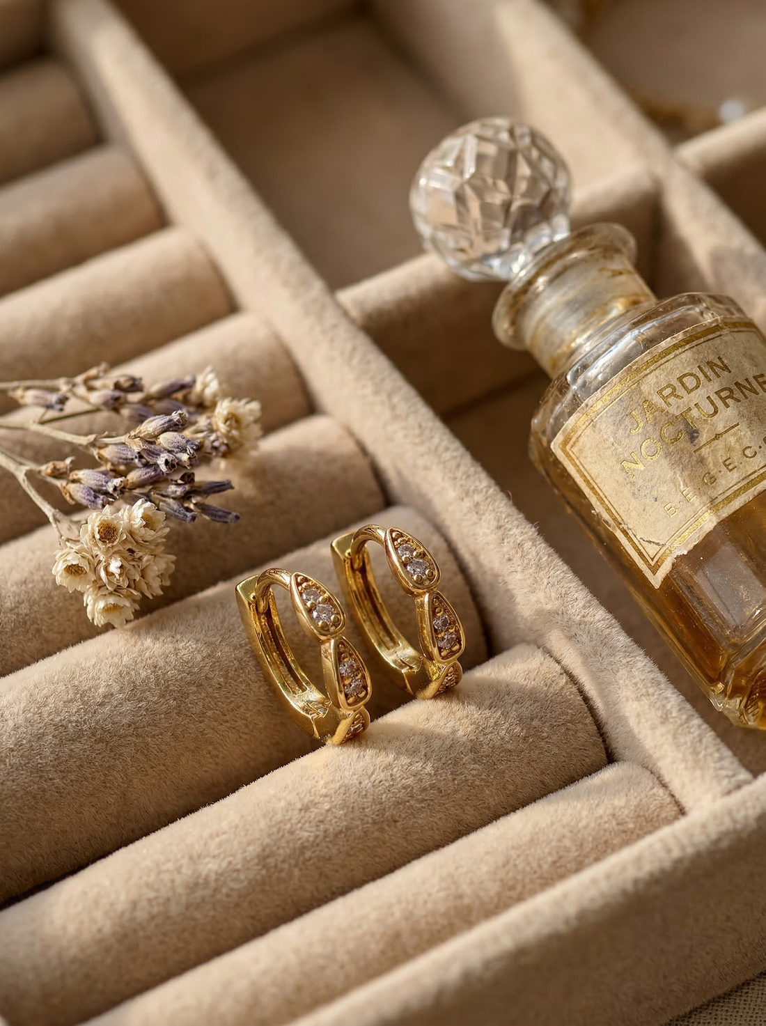 Rena Huggie Earrings styled in a warm editorial detail