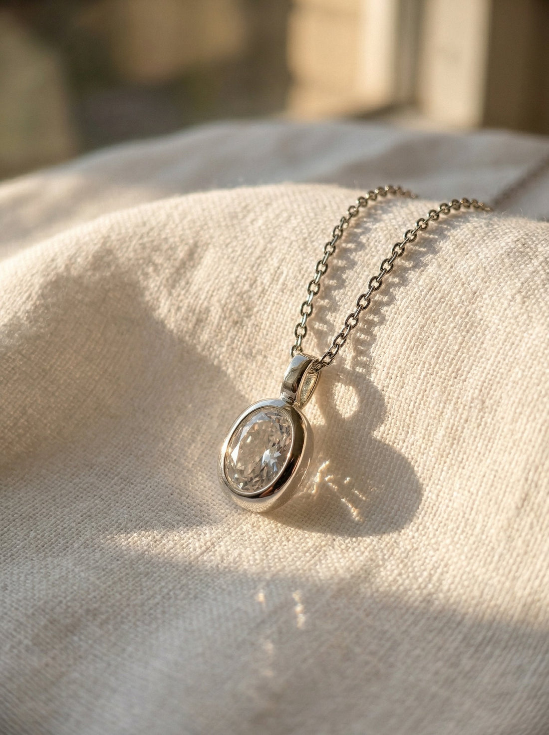 Vela Oval CZ Pendant Necklace close-up scene