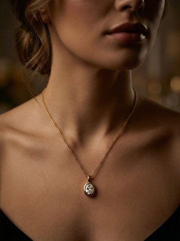 Woman wearing gold pendant necklace following jewelry etiquette
