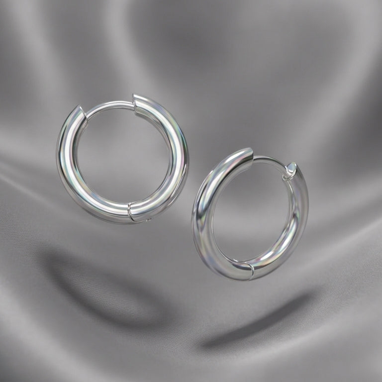 Aura Oval Hoop Earrings layered pendant styling image