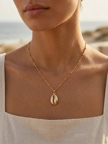 Cora Gold Cowrie Shell Pendant Necklace hypoallergenic necklace by HyraMode