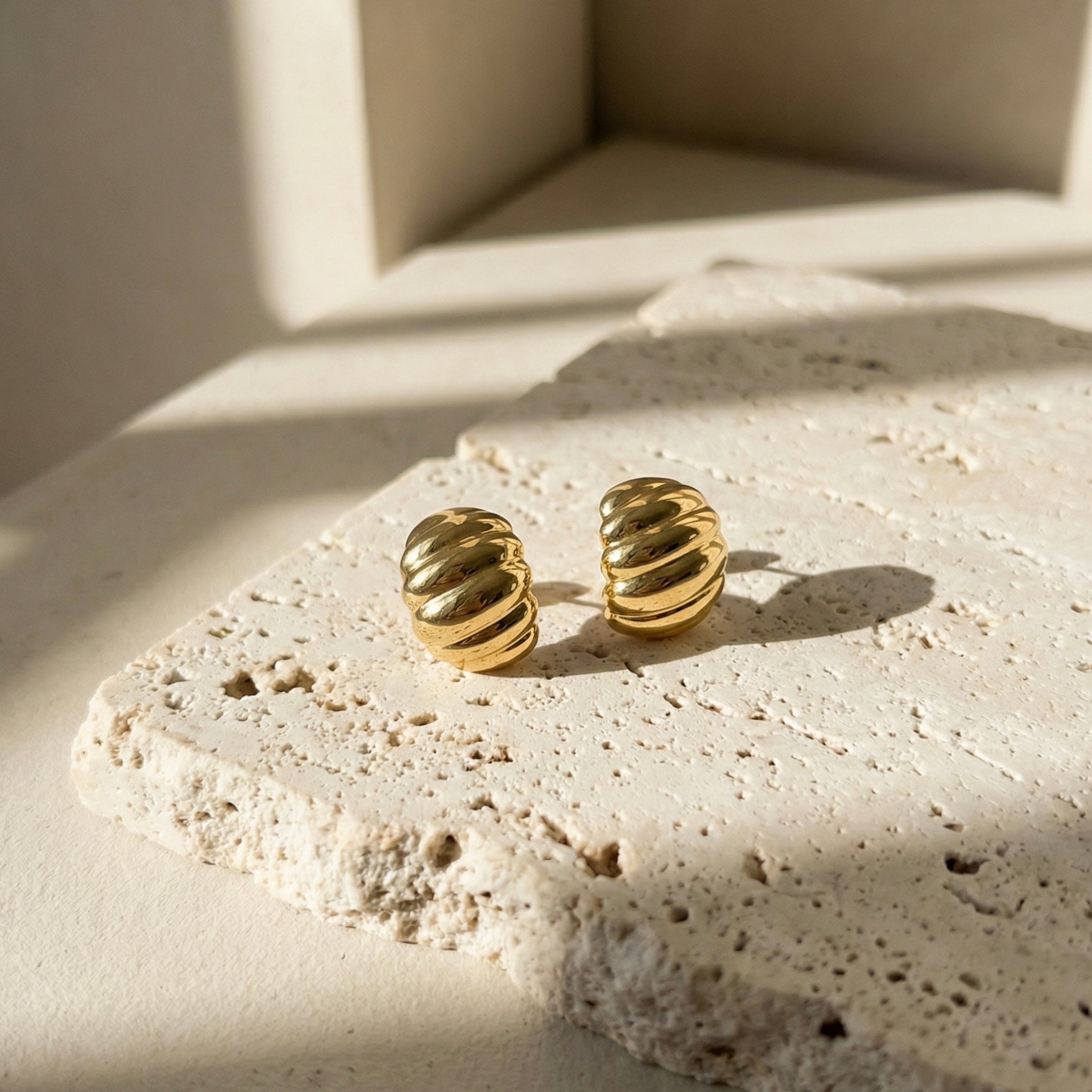 Caia Croissant Huggie Earrings hypoallergenic earrings by HyraMode