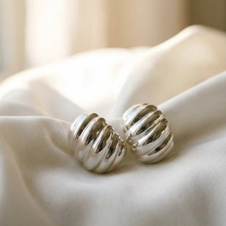 Caia Croissant Huggie Earrings hypoallergenic earrings by HyraMode