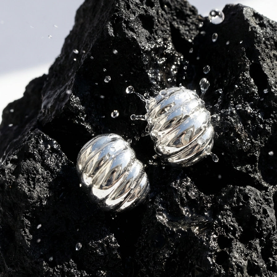 Caia Croissant Huggie Earrings hypoallergenic earrings by HyraMode