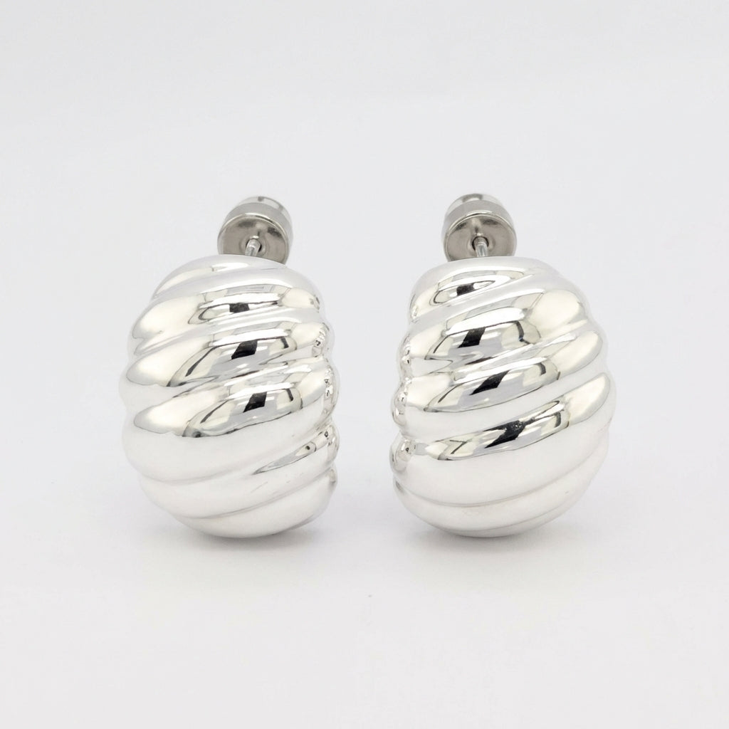 Caia Croissant Huggie Earrings hypoallergenic earrings by HyraMode