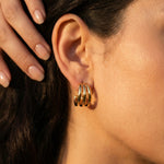 Tria Triple Hoop Stud Earrings in gold, detail view