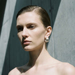 Tria Triple Hoop Stud Earrings in gold, angled view